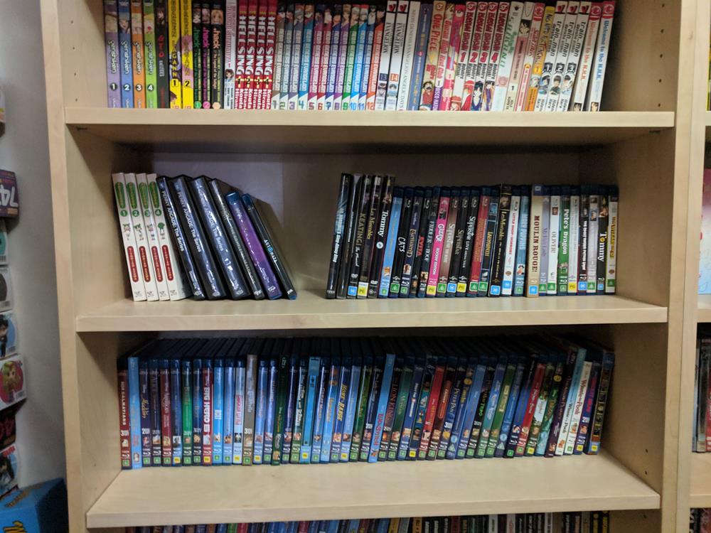 Shelf of manga and DVDs and Blu-rays